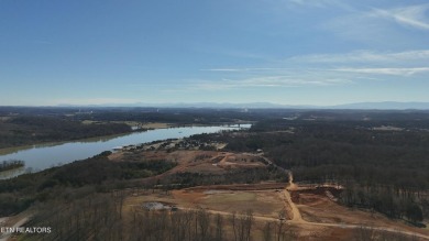 Nestled on a scenic ridge within an exclusive golf community on Tennessee National Golf Club in Tennessee - for sale on GolfHomes.com, golf home, golf lot