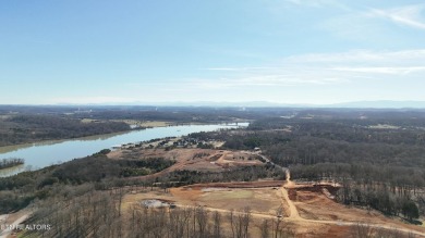Nestled on a scenic ridge within an exclusive golf community on Tennessee National Golf Club in Tennessee - for sale on GolfHomes.com, golf home, golf lot