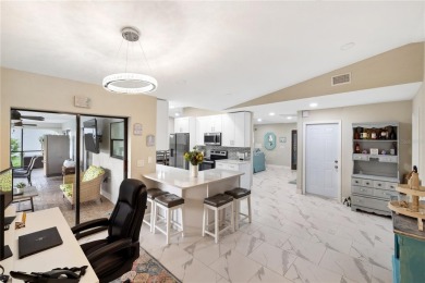 Welcome to this beautifully updated 4-bedroom, 2-bathroom pool on Deep Creek Golf Club in Florida - for sale on GolfHomes.com, golf home, golf lot