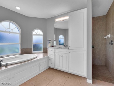 Step into this beautifully maintained 3-bedroom, 2-bath on Coral Oaks Golf Course in Florida - for sale on GolfHomes.com, golf home, golf lot