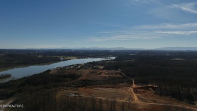Nestled on a scenic ridge within an exclusive golf community on Tennessee National Golf Club in Tennessee - for sale on GolfHomes.com, golf home, golf lot