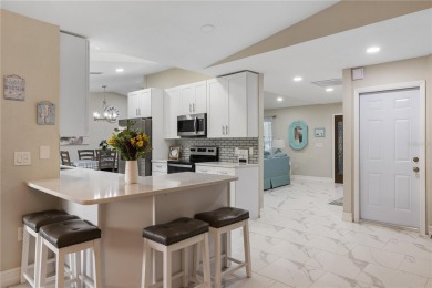 Welcome to this beautifully updated 4-bedroom, 2-bathroom pool on Deep Creek Golf Club in Florida - for sale on GolfHomes.com, golf home, golf lot