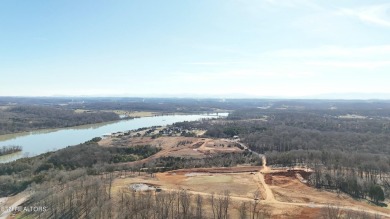 Nestled on a scenic ridge within an exclusive golf community on Tennessee National Golf Club in Tennessee - for sale on GolfHomes.com, golf home, golf lot