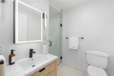 Experience coastal elegance in this fully renovated 2 bed, 2 on Carnegie Abbey Club in Rhode Island - for sale on GolfHomes.com, golf home, golf lot