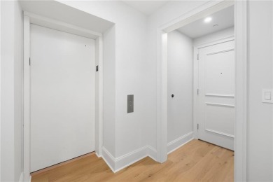 Experience coastal elegance in this fully renovated 2 bed, 2 on Carnegie Abbey Club in Rhode Island - for sale on GolfHomes.com, golf home, golf lot