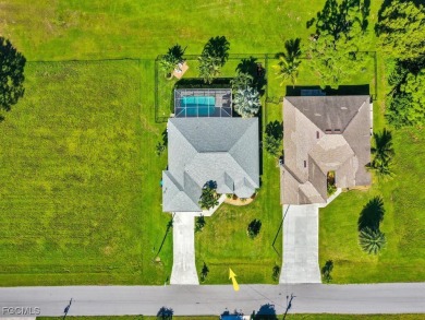 Step into this beautifully maintained 3-bedroom, 2-bath on Coral Oaks Golf Course in Florida - for sale on GolfHomes.com, golf home, golf lot