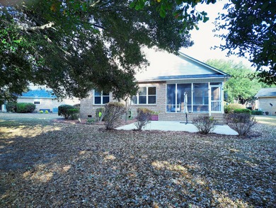Cozy Two Bedroom, Two Bath Patio Home nestled at end of on Players Course At Wyboo Plantation in South Carolina - for sale on GolfHomes.com, golf home, golf lot