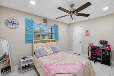 Welcome to this beautifully updated 4-bedroom, 2-bathroom pool on Deep Creek Golf Club in Florida - for sale on GolfHomes.com, golf home, golf lot