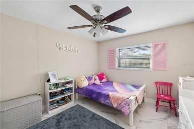 Welcome to this beautifully updated 4-bedroom, 2-bathroom pool on Deep Creek Golf Club in Florida - for sale on GolfHomes.com, golf home, golf lot