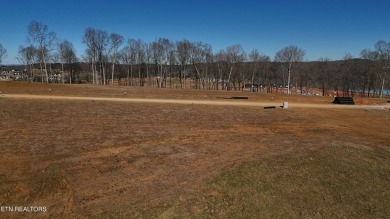 Nestled on a scenic ridge within an exclusive golf community on Tennessee National Golf Club in Tennessee - for sale on GolfHomes.com, golf home, golf lot