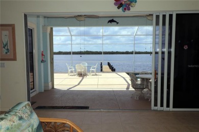 Welcome to your riverfront oasis on the scenic Peace River--a on Deep Creek Golf Club in Florida - for sale on GolfHomes.com, golf home, golf lot