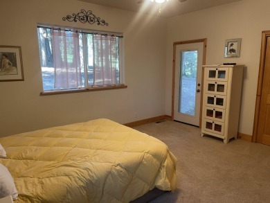 This charming 3 bedroom 2 bathroom mountain home is the perfect on Lake Almanor Country Club in California - for sale on GolfHomes.com, golf home, golf lot