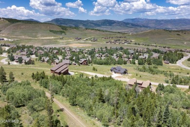This 0.76-acre lot ski in ski out homesite is nestled among on Headwaters Golf Course At Granby Ranch in Colorado - for sale on GolfHomes.com, golf home, golf lot