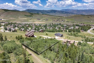 This 0.76-acre lot ski in ski out homesite is nestled among on Headwaters Golf Course At Granby Ranch in Colorado - for sale on GolfHomes.com, golf home, golf lot