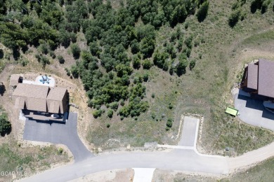 This 0.76-acre lot ski in ski out homesite is nestled among on Headwaters Golf Course At Granby Ranch in Colorado - for sale on GolfHomes.com, golf home, golf lot