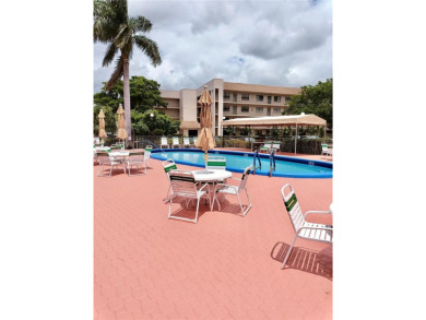 PRICE IMPROVED. Corner Condo with Stunning Golf Course Views
 on Sunrise Lakes Phase IV Golf Course in Florida - for sale on GolfHomes.com, golf home, golf lot