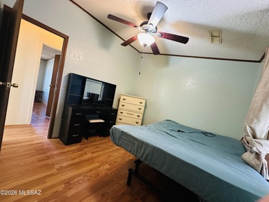 Step into this vibrant manufactured home just minutes from the on Mt. Graham Municipal Golf Course in Arizona - for sale on GolfHomes.com, golf home, golf lot