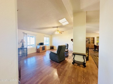 Step into this vibrant manufactured home just minutes from the on Mt. Graham Municipal Golf Course in Arizona - for sale on GolfHomes.com, golf home, golf lot