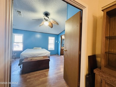 Step into this vibrant manufactured home just minutes from the on Mt. Graham Municipal Golf Course in Arizona - for sale on GolfHomes.com, golf home, golf lot