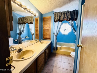 Step into this vibrant manufactured home just minutes from the on Mt. Graham Municipal Golf Course in Arizona - for sale on GolfHomes.com, golf home, golf lot