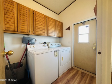 Step into this vibrant manufactured home just minutes from the on Mt. Graham Municipal Golf Course in Arizona - for sale on GolfHomes.com, golf home, golf lot