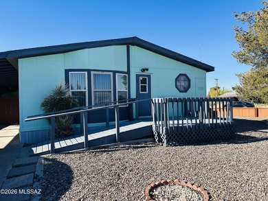 Step into this vibrant manufactured home just minutes from the on Mt. Graham Municipal Golf Course in Arizona - for sale on GolfHomes.com, golf home, golf lot