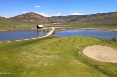 This 0.76-acre lot ski in ski out homesite is nestled among on Headwaters Golf Course At Granby Ranch in Colorado - for sale on GolfHomes.com, golf home, golf lot