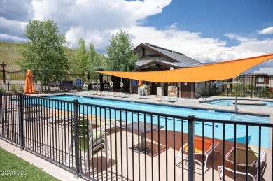 This 0.76-acre lot ski in ski out homesite is nestled among on Headwaters Golf Course At Granby Ranch in Colorado - for sale on GolfHomes.com, golf home, golf lot