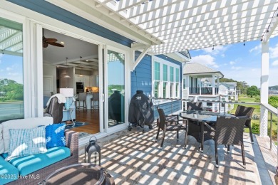 This modern luxury home offers a spectacular waterfront on Members Club At St. James Plantation in North Carolina - for sale on GolfHomes.com, golf home, golf lot