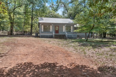 Adorable Cabin in the Woods on 3 Wooded Acres on Holly Lake Ranch Golf Club in Texas - for sale on GolfHomes.com, golf home, golf lot