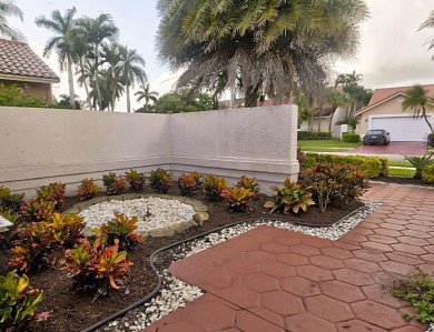 Exquisite newly renovated centrally located home with incredible on Boca Greens Country Club in Florida - for sale on GolfHomes.com, golf home, golf lot