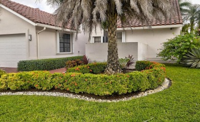 Exquisite newly renovated centrally located home with incredible on Boca Greens Country Club in Florida - for sale on GolfHomes.com, golf home, golf lot