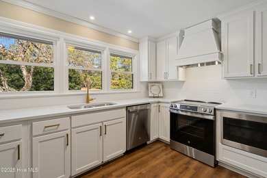 Elevated one-level living in this updated brick home on the golf on Wilson Country Club in North Carolina - for sale on GolfHomes.com, golf home, golf lot