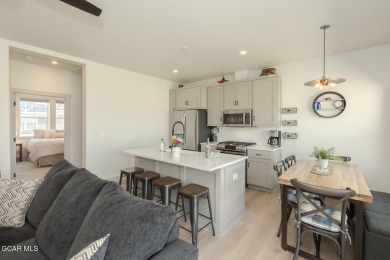 Discover this fully furnished, move-in-ready 1,360 sqft on Grand Elk Ranch and Club in Colorado - for sale on GolfHomes.com, golf home, golf lot