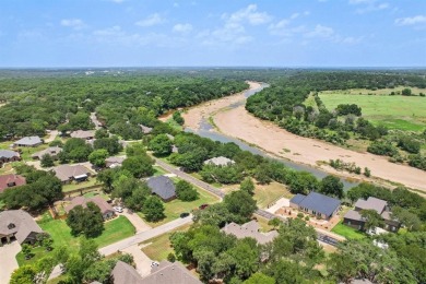 This riverfront lot offers an exceptional blend of natural on Pecan Plantation Country Club in Texas - for sale on GolfHomes.com, golf home, golf lot