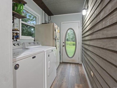 THIS CHARMING 2 STORY HOME CENTRALLY LOCATED IN BEAUTIFUL HOT on DeSoto Golf Course in Arkansas - for sale on GolfHomes.com, golf home, golf lot