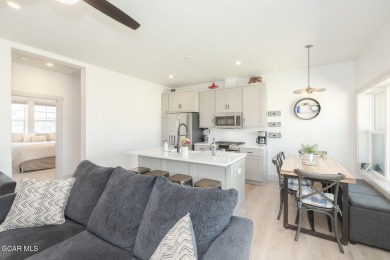 Discover this fully furnished, move-in-ready 1,360 sqft on Grand Elk Ranch and Club in Colorado - for sale on GolfHomes.com, golf home, golf lot