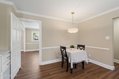 Elevated one-level living in this updated brick home on the golf on Wilson Country Club in North Carolina - for sale on GolfHomes.com, golf home, golf lot