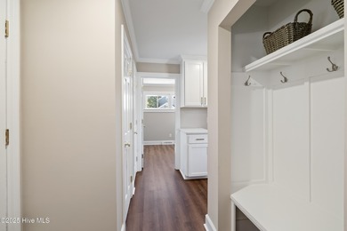 Elevated one-level living in this updated brick home on the golf on Wilson Country Club in North Carolina - for sale on GolfHomes.com, golf home, golf lot