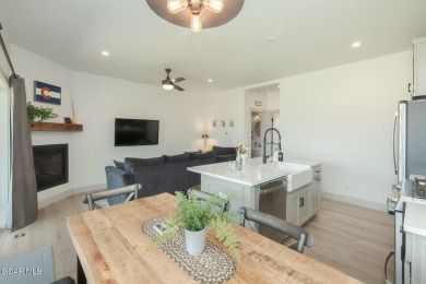 Discover this fully furnished, move-in-ready 1,360 sqft on Grand Elk Ranch and Club in Colorado - for sale on GolfHomes.com, golf home, golf lot