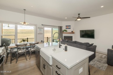 Discover this fully furnished, move-in-ready 1,360 sqft on Grand Elk Ranch and Club in Colorado - for sale on GolfHomes.com, golf home, golf lot