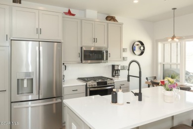 Discover this fully furnished, move-in-ready 1,360 sqft on Grand Elk Ranch and Club in Colorado - for sale on GolfHomes.com, golf home, golf lot