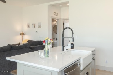 Discover this fully furnished, move-in-ready 1,360 sqft on Grand Elk Ranch and Club in Colorado - for sale on GolfHomes.com, golf home, golf lot