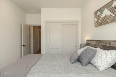 Discover this fully furnished, move-in-ready 1,360 sqft on Grand Elk Ranch and Club in Colorado - for sale on GolfHomes.com, golf home, golf lot