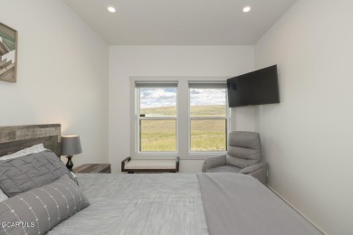 Discover this fully furnished, move-in-ready 1,360 sqft on Grand Elk Ranch and Club in Colorado - for sale on GolfHomes.com, golf home, golf lot