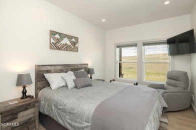 Discover this fully furnished, move-in-ready 1,360 sqft on Grand Elk Ranch and Club in Colorado - for sale on GolfHomes.com, golf home, golf lot