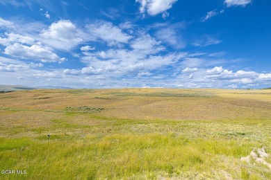 Discover this fully furnished, move-in-ready 1,360 sqft on Grand Elk Ranch and Club in Colorado - for sale on GolfHomes.com, golf home, golf lot