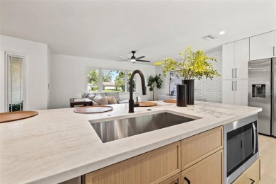 Beautifully renovated, this 3 bed, 2 bath home has over 1,600 on Countryside Country Club in Florida - for sale on GolfHomes.com, golf home, golf lot