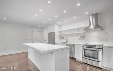 Experience modern elegance in this stunning top-floor condo on Pine Brook Golf Course in New Jersey - for sale on GolfHomes.com, golf home, golf lot