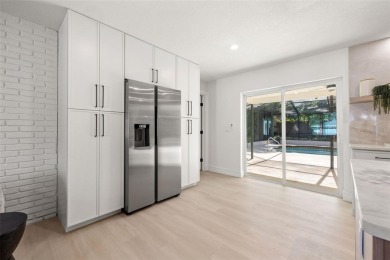 Beautifully renovated, this 3 bed, 2 bath home has over 1,600 on Countryside Country Club in Florida - for sale on GolfHomes.com, golf home, golf lot